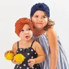 18 färger Söt spädbarnsbarn Unisex Ball Knot Indisk Turban Cap Barn Vår Höst Kepsar Baby Donut Hat Solid Färg Bomull Hårband M596