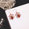 Orecchini pendenti con gancio per orecchio di perle in stile cinese Orecchini pendenti con zirconi di cristallo rosso moda Lampadario pendente Gioielli vintage da donna per la festa di nozze