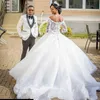 2020 Długie rękawy Koronki Suknie Ślubne Suknie Ślubne z aplikacjami Sweep Pociąg Suknie Ślubne Dubai Tulle