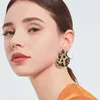 Boucles d'oreilles tendance creuses à la mode en gros avec boucles d'oreilles léopard en géométrie européenne et américaine