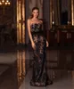 Charmante schwarze Pailletten-Meerjungfrau-Abendkleider, trägerloser Ausschnitt, Feder, rückenfrei, Ballkleider, Sweep-Zug, formelles Kleid in Übergröße