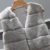 フェイクファーベストジャケットコート女性の冬暖かい上着オーバーコートパーカーノースリーブ V ネックショートチョッキプラス 4X 6Q23051