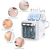 USA 6 en 1 Portable Diamond Microdermabrasion Ultrasonic Cold Hot Hammer Blackhead Removal Machine pour Spa Home Use