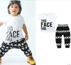 Baby flicka kläder pojke blommiga toppar byxor kostymer tecknad randig kläder uppsättningar camo brev djur utskrift t-shirt byxor outfits 23 stil dhl 5387