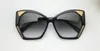 Vente en gros de lunettes de soleil de designer pour femmes cadre en œil de chat populaire style généreux et surdimensionné 0410 lunettes de protection uv400