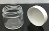 bougie noire dans un pot en verre