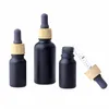 Matte Black Glass e liquid Essential Oil Perfume Bottle with Reagent Pipette Dropper and Wood Grain Cap 10/30ml