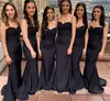 Nuovo abito da damigella d'onore nero a buon mercato Mermaid Spaghetti Strap Backless Appliques Top Abiti da damigella d'onore lunghi Invitato a un matrimonio gotico