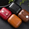 Etui en cuir pour AirPods PU Mode Fermoir Porte-clés Clé de carabine Écouteurs Écouteurs Couvercle rétro avec crochet anti-perdu