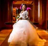 Koronkowe aplikacje arabskie sukienki ślubne w dużych rozmiarach głębokie v szyja długie rękawy sukienki ślubne warstwy Afrykańskie sukienki ślubne szat 4751317