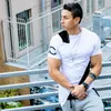 Мужчины Лето Мода Стиль T -футболки Фитнес и Бодибилдинг Slim Fit T Shirt Досуг Мышцы Мужской Короткие рукава Одежда Tee Топы Качество