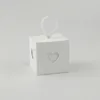 100st Kraft Vit Papper Candy Box Heart Hollow Gift Wrap Födelsedag Dusch Bröllopsfest Chokladlådor Unik och vacker design