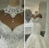 Abiti da sposa a sirena araba di lusso Dubai Perline Cristalli Corte dei treni Backless Plus Size Abiti da sposa Personalizzati