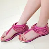 Heißer Verkauf - Sommer Neue Feste Süße Stil Tanga Sandalen Für Frauen Mode String Bead Alias Qualität Weibliche Flache Mit Schuhe A66-2