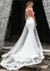 Modne Suknie ślubne Syrenki Bez Rękawów Z Koronkowymi Aplikacje Sweep Train Overskirt Sukienka Bridal Klejnot Neck Illusion Powrót Suknie Ślubne