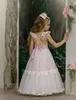 Ange 2020 robes de filles de fleur pour le mariage rose clair dentelle enfants vêtements de cérémonie dos nu longueur de plancher robe de fille de fille