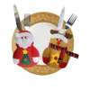 クリスマススノーマンサンタクローステーブルウェアホルダーシルバーウェアホルダーポケットセットナイフとフォークバッグクリスマスパーティーディナーテーブル装飾