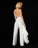 Op maat gemaakte plus maten kanten jumpsuit avondjurken afneembare trein sexy illusie lijfje chiffon backless strand bruidsjurken