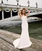 2020 Djup V-Neck Bodice Double Layered Mermaid Bröllopsklänning med avtagbar tåg Illusion Tatuering-Style Back Bridal Dress