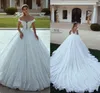 Sexig ny Dubai A Line Wedding Dresses Off Shoulder Full Lace Appliques Pärled Tulle Court Train Arabic Backless Formal Bridal Clows 403