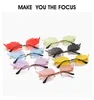 New small fish frameless sunglasses wholesale Women's European and American metal frame ocean piece Sunglasses Flame feather hedgehog glasse