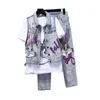 ヨーロッパのスタイルの穴ジーンズセットレディース2ピースセット春夏の衣装新しいベストコート+セブンポイントデニムパンツ女子学生