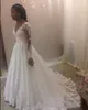 Vit En linje Tulle Långärmad Bröllopsklänningar Sweetheart Drop Waist Lace Applique Bridal Dresses Nigeria med pärlor