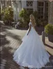 Élégante dentelle blanche une ligne robes de mariée sur l'épaule mancherons chérie appliques longueur de plancher tulle dos nu robe de mariée robes
