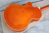 Orange semihollow electric guitar with gold pickup rosewood scale vibrato system customized service9456701