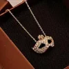 Statement Necklaces Fine Jewelry Gold plated Full Rhinestone Bohemian Mask Pierced Necklaces & Pendants