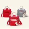 Backpack de fraldas multifuncionais Backpack Mother Care Hobos Bags Baby Filler Nappy Bags para mamãe com ornamentos de cavalos Mochilas de viagem