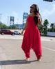 Женщины Слинг Комбинезоны Сплошные цвета лета рукавов Rompers Свободные брюки Backless Комбинезон Повседневная Пляж Ромпер Цельный Bodysuit Club 2020