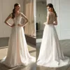 Georges Hobeika 2020 Abiti da sposa Gioiello Maniche lunghe Abiti da sposa in pizzo Bottone posteriore Sweep Train Abito da sposa Bohemian A Line