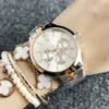 Montre-bracelet de marque de mode pour les montres à quartz de bande de métal en acier de style de drapeau de fille des femmes TOM 05