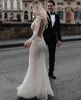 2021 Abiti da sposa a sirena Scollo a V Maniche lunghe Appliques in pizzo Abiti da sposa Custom Made Backless Sweep Train Beach Robe De Soiree