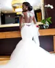 2020 New Sexy African Black Girl Mermaid Abiti da sposa con spalle scoperte Sheer Neck Appliques in pizzo con perline Hollow Back Sweep Train Abiti da sposa