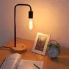 Creativa sencilla cálido y moderno lámpara de mesa de hierro forjado y madera maciza dormitorio romántico de noche luz de la noche regulable 10132