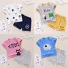 Neonato neonato Bambini Neonate Vestiti senza maniche Pagliaccetto in cotone tuta Outfit 2 pezzi / set Top e pantaloni Baby Boy vestiti