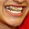 New Fashion Gold Denti Brace Hip Hop Denti singoli Grillz Crown Cross Gun Bocca dentale Fang Grills Tooth Cap Cosplay Party Rapper Jewelry