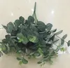 Foglie artificiali Rami Pianta di simulazione Bouquet di eucalipto Decorazione domestica in plastica Soldi finti Erba Festa di nozze Decorazioni per la casa313B