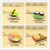 New Style Japanese Cuisine Sushi saumon Simulation alimentaire Keychain Pendentif M. Mlle Sac voiture Porte-clés Creative Petit cadeau