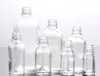 Commercio all'ingrosso Clear 5ml 10ml 15ml 20ml 30ml 50ml 100ml Bottiglie di vetro Olio essenziale Cosmetici per la cura della pelle Bottiglie di vetro con tappo contagocce nero