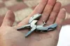 Portable Multifunction Folding Plier Stainless Steel Foldaway Knife Keychain Screwdriver Camping Survival EDC Tools Travel Kits