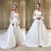 Goedkoop eenvoudige elegante Boemische sexy witte jumpsuits jurken met lange mouwen zie door nek trouwjurken Vestido de noiva