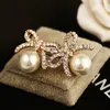 Mode utsökt zirkon rosett pärla örhängen högkvalitativa 18K guldpläterade hypoallergena kvinnliga söta flickörhängen