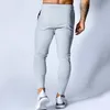 Pantaloni da jogging neri Pantaloni da uomo Pantaloni sportivi in cotone Pantaloni skinny casual Palestra maschile Allenamento fitness Autunno Abbigliamento sportivo da corsa