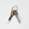 Mini porte-clés en acier EDC Tournevis multifonctions Forme de clé Tournevis à fente Porte-clés Outil de réparation de pocheMini jeu de tournevis Porte-clés