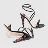 Sexy Open Toe Serpentine Snake Sandali con tacco alto Donna Party Prom Scarpe da sposa Summer Runway Gold Black Pink Green Leather Bowknot Cross Strap Sandalia Feminina