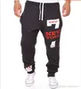 Pantaloni da uomo Uomo Bianco Grigio Elastico in vita Lettere stampate Allentato Casual Harem Baggy Hip Hop Dance Pantaloni sportivi Pantaloni Pantaloni Stile Plus Size