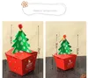 20 PCS Lot Kerstboomvorm Geschenkdoos met gebonden klokken 3D Candy Box -pakket Cartoon Gedrukt Craft Red Wikkelpapier Box293V4628699